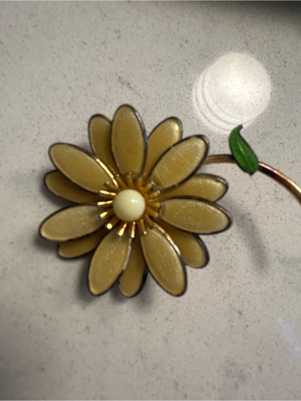 Yellow Enamel Daisy Brooch with Green Leaf Accent